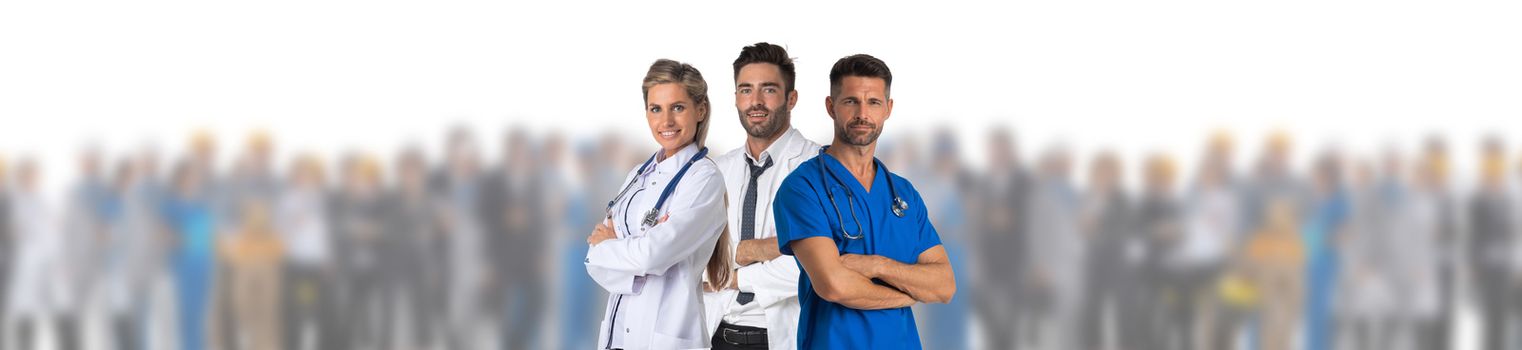 Team of three doctors standing in front of crowd of many people patients isolated on white background medical feat concept