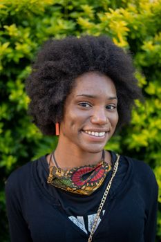 Portrait of happy african woman with afro