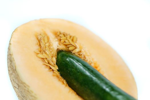 Melon and cucumber on white background, Sex concept. isolated