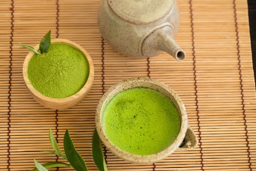 Set of matcha powder bowl wooden spoon and whisk green tea leaf Organic Green Matcha Tea ceremony.