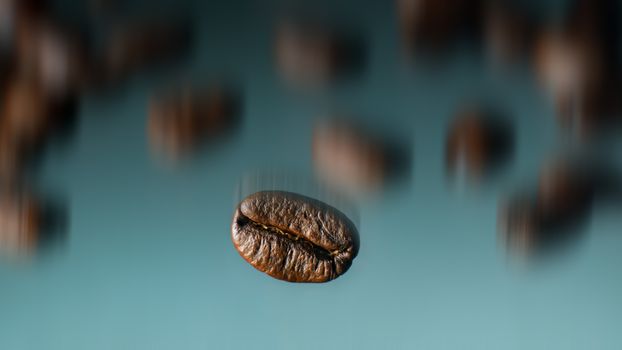 Roasted coffee beans pile falling