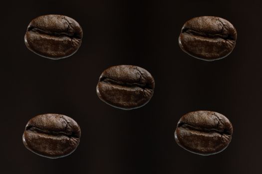 Coffee beans isolated on black background.