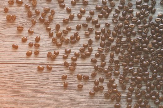 Coffee beans. On a wooden background. Top view