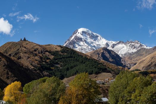 Gergeti Trinity Church is a popular name for Holy Trinity Church near the village of Gergeti in Georgia. The church is situated on the right bank of the river Chkheri. Prominent church high up above valley below Mt Kazbek