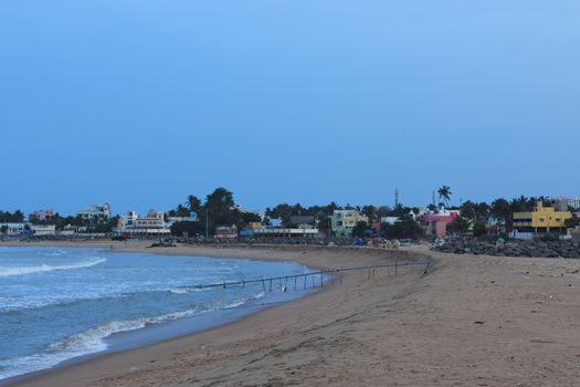 Beach with view of Kovalam City in Chennai