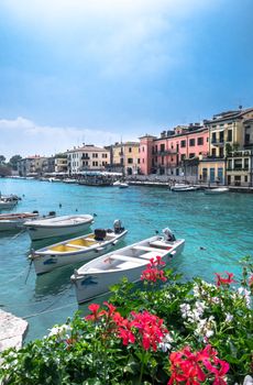 Peschiera del Garda (VR) ITALY - June 2, 2018. Colorful harbor and boats view.