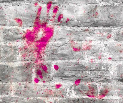 Pink handprint on stone wall. Ideal for your creative background.