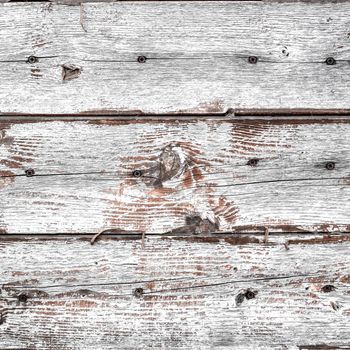 Vintage wooden planks with rusty screws