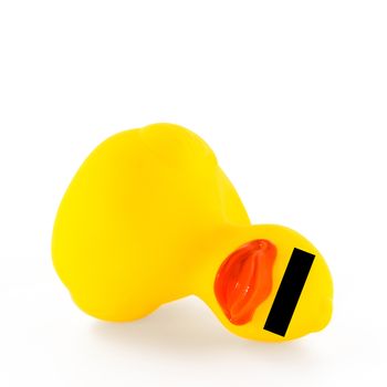 Fallen ducky with censorship. Concept of violence and crimes towards children. Violated childhood, silence and trauma.