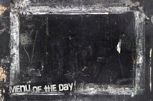 "Menu of the day" chalkboard background. Weathered and distressed template. It can be used as a food menu, poster, wallpaper and more.