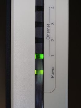 Ethernet and power green led on a modem router