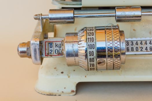 close-up of a mechanical gauge of a weight scale of the 1950