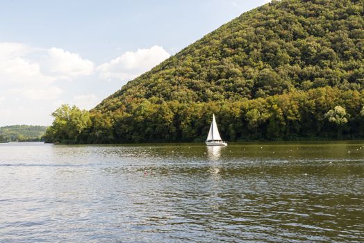 piediluco lake with a sailing boat on a sunny day
