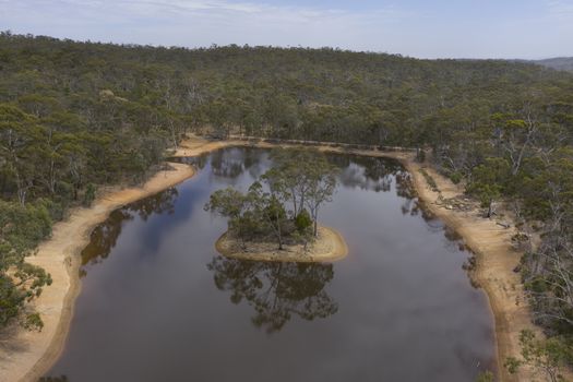 Aerial view of a drought affected water reservoir in regional Australia