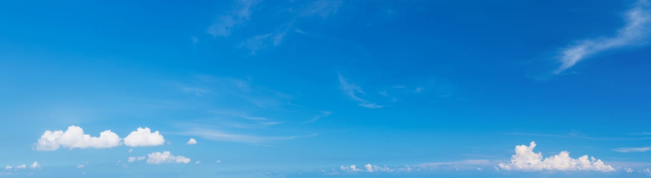 Soft white clouds against blue sky ,Panoramic fluffy clouds in the blue sky