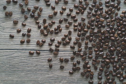 Coffee beans. On a wooden background. Top view