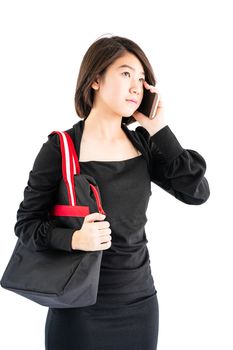 Woman carrying a black shopping bag using cellphone shopping online isolate on white background