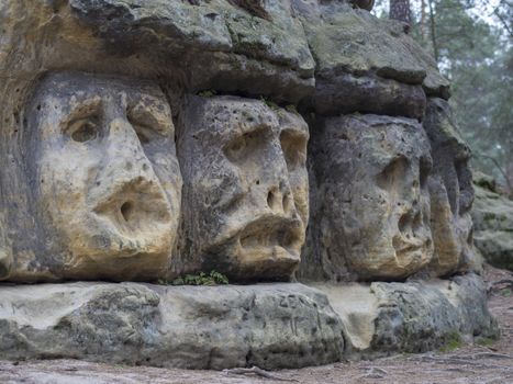 big head sculpted in 1846 by Vaclav Levy to the sand stone rock in Zelizy, czech republic