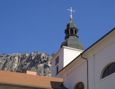 Baroque Benedictine Monastery, convent and church Saint John under the Cliff, Svaty Jan pod Skalou, Beroun, Central Bohemian Region, Czech Republic, Famous pilgrimage place, spring sunny day, blue sky.