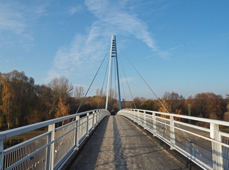 empty footbridge on steel rope over the river Elbe, Czech republik