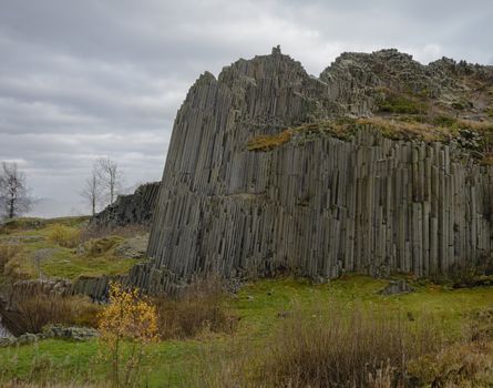 basalt column pillars lava vulcanic rock formation organ shape with lake panska skala in kamenicky senov prachen czech republic