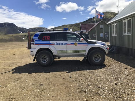 Alftavatn Hut, Iceland, July 2019: Icelandic police patrol super jeep in region logreglan, parked in front of hiker's hut