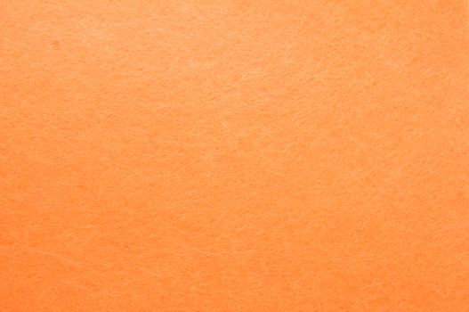 Texture background of Orange velvet or flannel as backdrop or wallpaper pattern for decoration