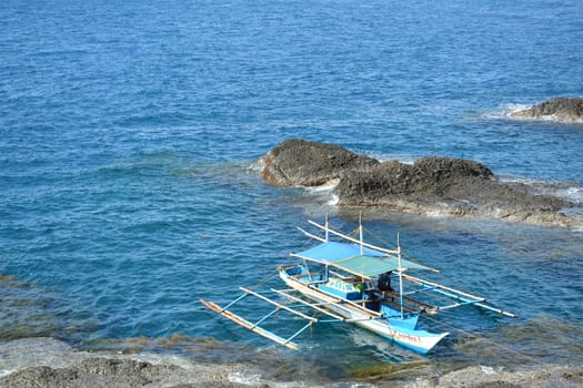 AURORA, PH - APRIL 21 - Rock formation and sea at Danao beach resort on April 21, 2019 in Dingalan, Aurora, Philippines.