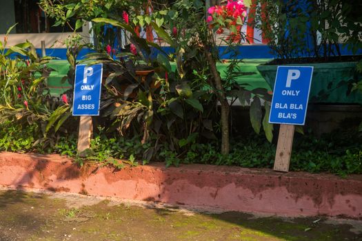 Funny parking signs near the beach of Goa.