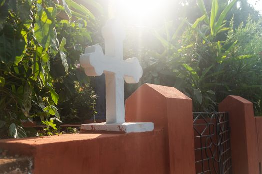 Fence of an old house in Goa, with a Catholic cross