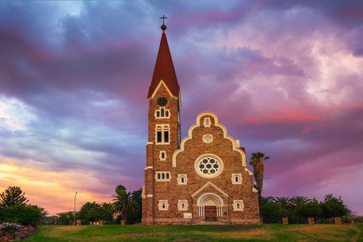 Dramatic sunset above Christchurch, a historic landmark and Lutheran church in Windhoek, capital city of Namibia.