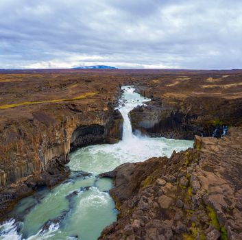 Aerial view of the Aldeyjarfoss waterfalls in Iceland. It is situated in the Highlands of Iceland at the Sprengisandur Highland Road.