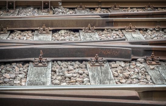 Railway track on gravel embankment. Old-fashioned mode.