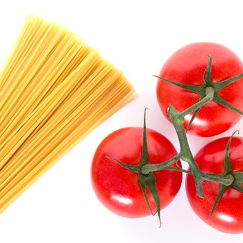Simple spaghetti ingredients on white background viewed from the top