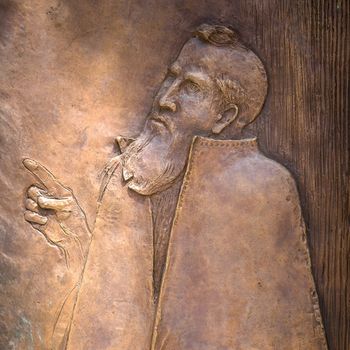 Bas-relief of St. Peter on the bronze door of a church.