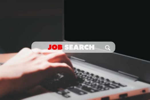 Job search concept. Find career online. Searching box find job with blurry hand and labtop background.