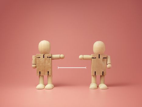 Two wooden doll on pink background. 
keep distance concept.
preventive measures.
infection control.