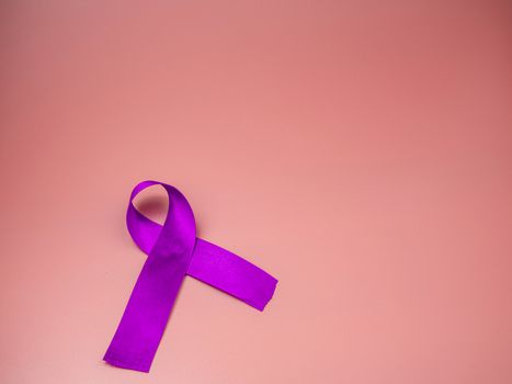 Purple ribbon symbol of world cancer. space copy.