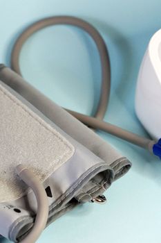 blood pressure monitor close-up on blue background