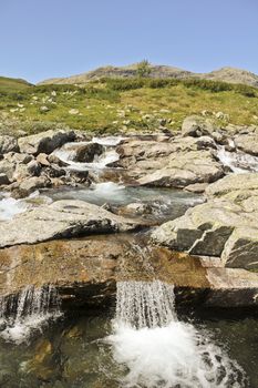 Beautiful Storebottåne river by the vavatn lake. Summer landscape in Hemsedal, Buskerud, Norway.