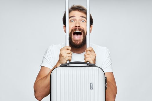 Cheerful man suitcase on vacation travel lifestyle destination airport