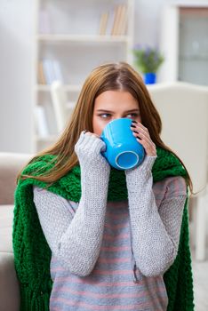 Sick woman suffering from flu at home