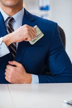 Businessman receiving his salary and bonus