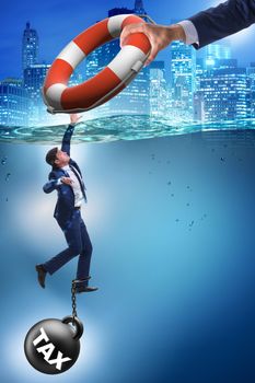Businessman being saved from high taxes