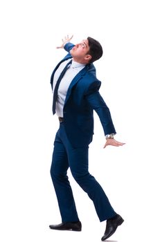 Businessman in funny pose isolated on white