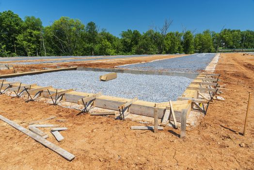 Horizontal shot of preparation for new construction slab foundation pouring.