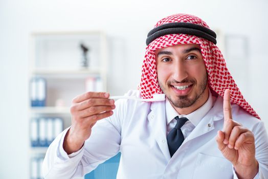 Arab dentist working on new teeth implant