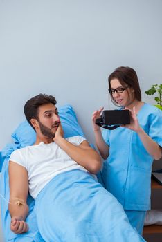 Patient man with VR glasses in telemedicine concept