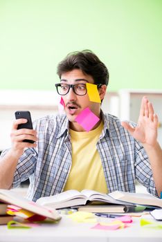 Student preparing for university exams with many conflicting priorities 