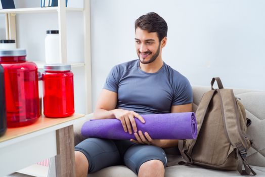 Young man getting ready for gym sports